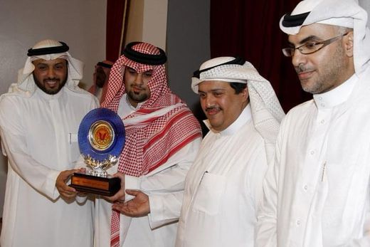 Receiving an award from Qadsiah for the media centre&rsquo;s work. The beginning of the ar